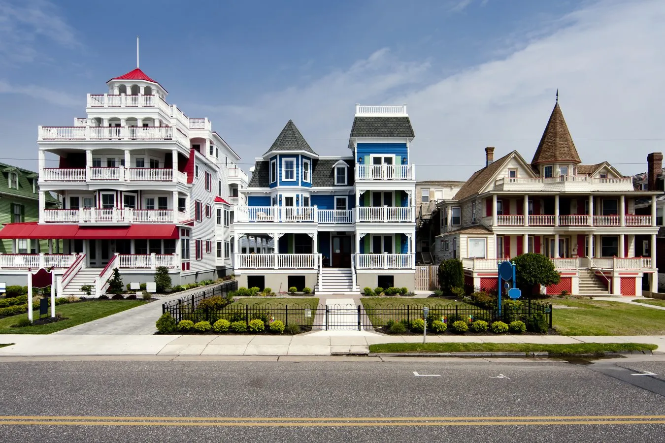 row of elaborate victorian beach homes in cape may nj, one of the best seaside towns on the east coast usa