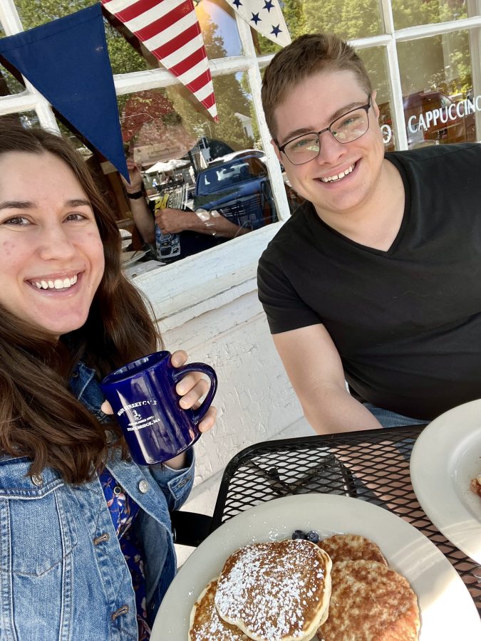 kate storm and jeremy storm eating breakfast at a diner in stockbridge ma in the berkshires, one of the best places to visit in new england