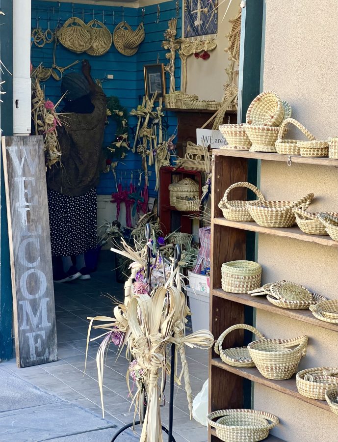 sweetgrass baskets on display for sale in a small shop in charleston south carolina. sweetgrass baskets are one of the most traditional souvenirs from charleston sc