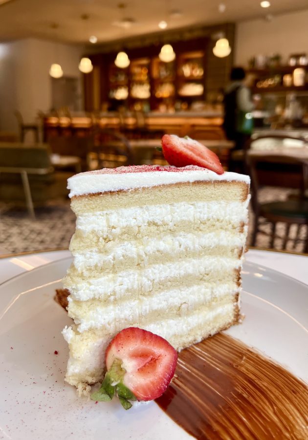 slice of ultimate coconut cake in bennes cafe, one of the best things to eat in charleston south carolina