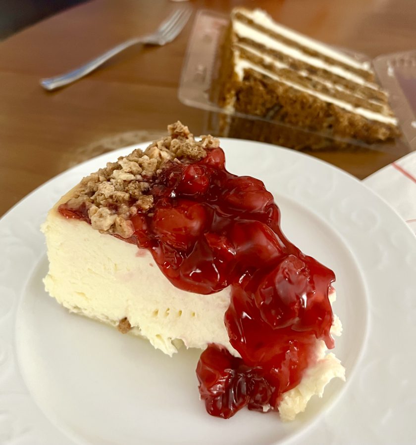 cherry cheesecake from juniors in new york city with carrot cake in the background