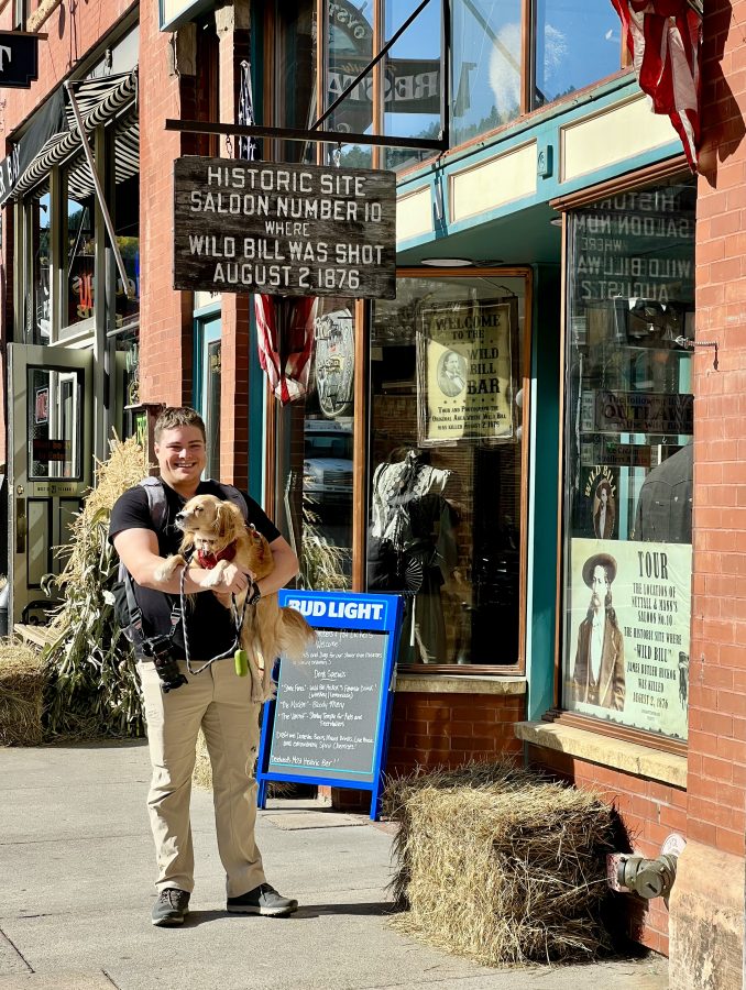 jeremy storm and ranger storm in front of saloon in deadwood, oneo f the best places in south dakota to visit