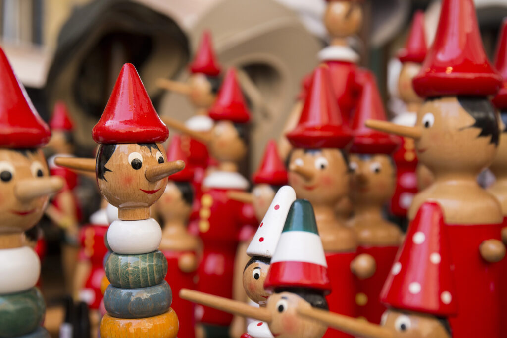 wooden pinocchio dolls for sale, one of the unique souvenirs from florence italy to consider
