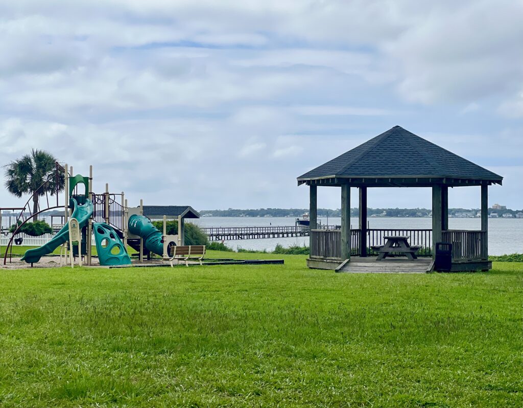 mitchell village community park on a cloudy day in morehead city north carolina with bogue sound in the background