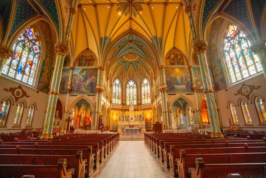 interior of the cathedral basilica of st john the baptist, one of the best places to visit in savannah georgia weekend getaway